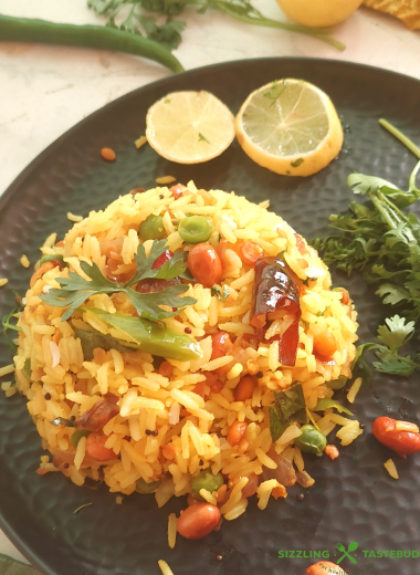 Lemon Rice is a South Indian flavoured rice with lemon and everyday spices - Gluten Free and Vegan, this is eaten for lunch or a quick snack. Also makes an excellent lunchbox recipe.