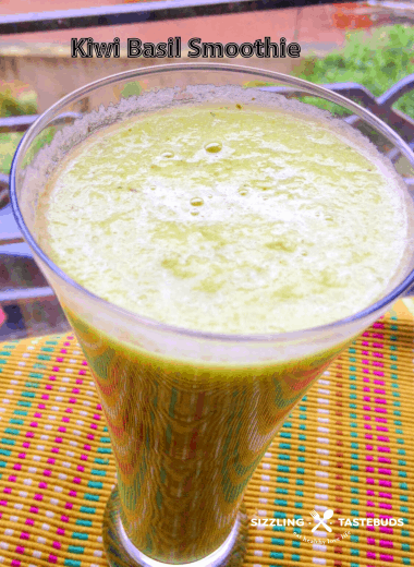 A refreshing, Sugar-free + Vegan Smoothie made with Fresh Kiwi and basil.