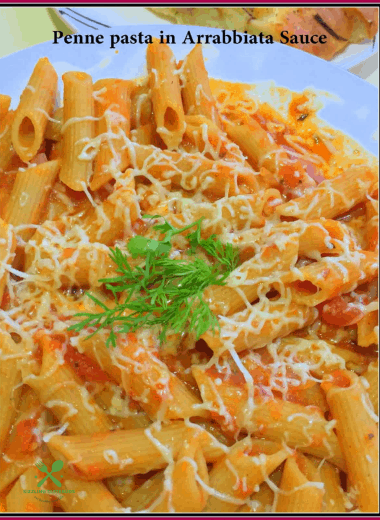 WholeWheat Penne Pasta in a creamy, cheesy homemade Arrabbiata sauce. Perfect for weeknight dinners or kids parties.