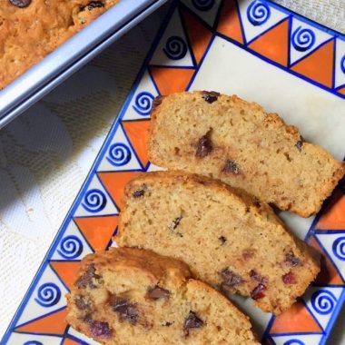 Let's bake a refined-sugar free and eggless Choco chip Banana bread with Cranberries and Coconut Sugar. Perfect for the Holidays or any celebration