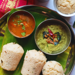 Kanchipuram Idli, a traditional dish from Tamil Nadu, is a spiced, steamed rice cake known for its unique blend of cumin, pepper, and ginger, offering a savory twist on the traditional Idli.