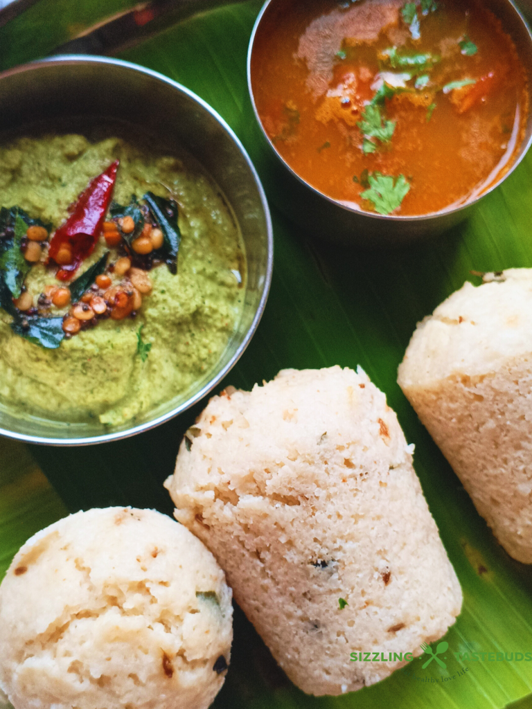 Kanchipuram Idli, a traditional dish from Tamil Nadu, is a spiced, steamed rice cake known for its unique blend of cumin, pepper, and ginger, offering a savory twist on the traditional Idli.