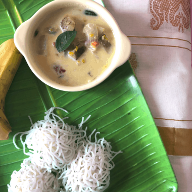 Idiyappam or Rice flour string hoppers is a gluten free and vegan dish from Kerala Cuisine. Served with stew or coconut milk.