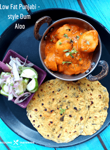 Punjabi style Dum aloo is a low fat, Gluten Free and Vegan Punjabi style gravy with Baby Potatoes, served with flatbread or steamed rice.