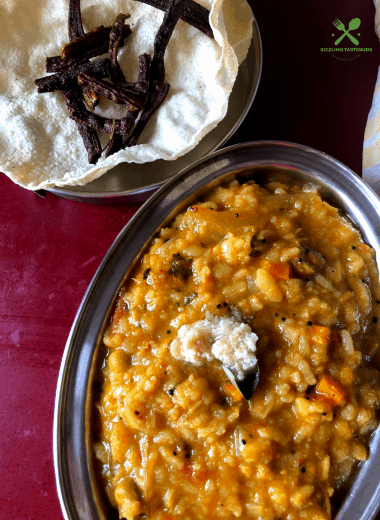 A Karnataka special One Pot Meal made with Lentils, veggies and flattened rice spiced with an aromatic powder.