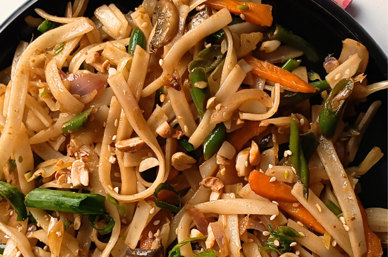 ‘Vegan Pad Thai is a quick to make Asian-style Dinner in under 30 mins. Totally customisable with protein of choice, it is a delicious meal that your family will surely love.