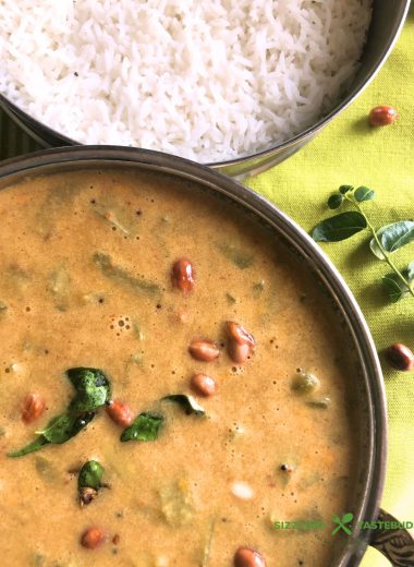 Pudalangai Paal Kootu is a rustic, Gluten Free Vegan + Curry made with snake gourd, Coconut milk and a spice paste. Served with steamed rice or Chapati.