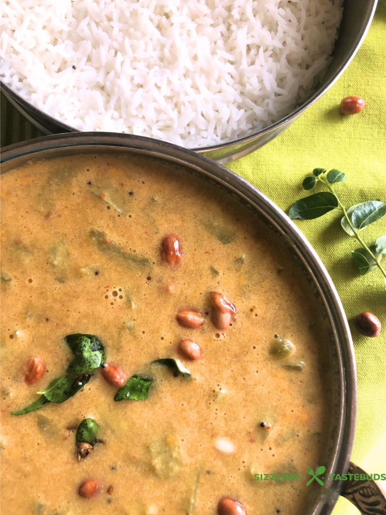 Pudalangai Paal Kootu is a rustic, Gluten Free Vegan + Curry made with snake gourd, Coconut milk and a spice paste. Served with steamed rice or Chapati.
