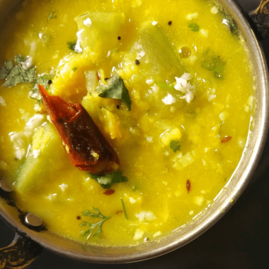 A no-onion, no garlic dal made with bottle gourd and cooked lentils. Tempered with basic kitchen spices. Served with steamed rice / Roti (Flatbreads)